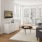 a living room with a couch and a table