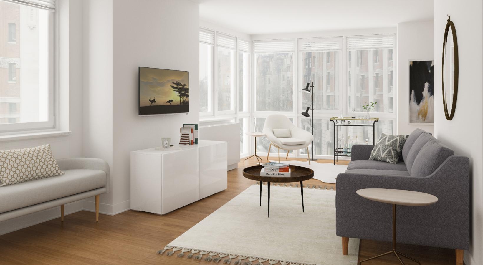 Spacious and well-lit living spaces a living room with a couch and a table