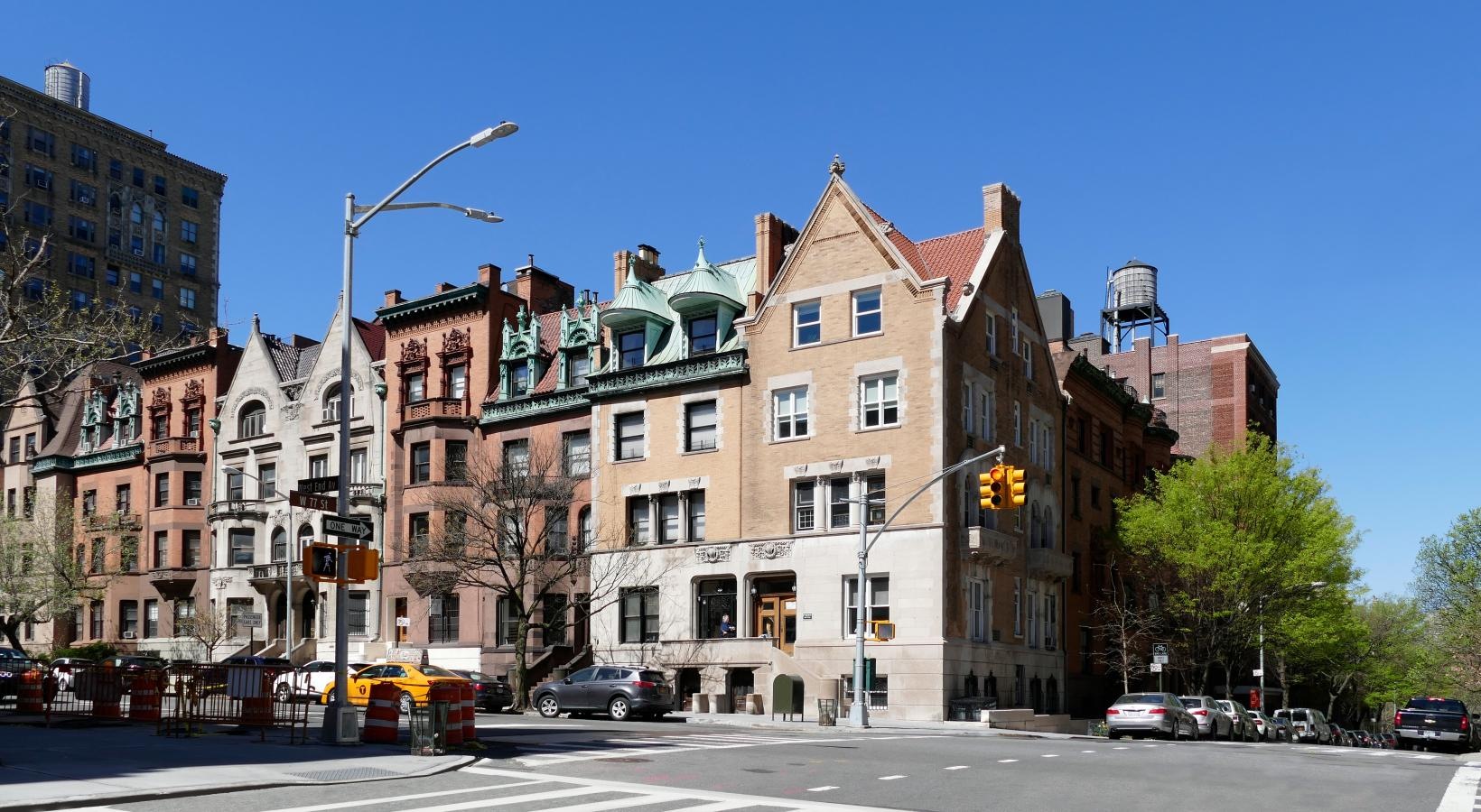Settle into comfort at The Larstrand a street with cars and buildings along it