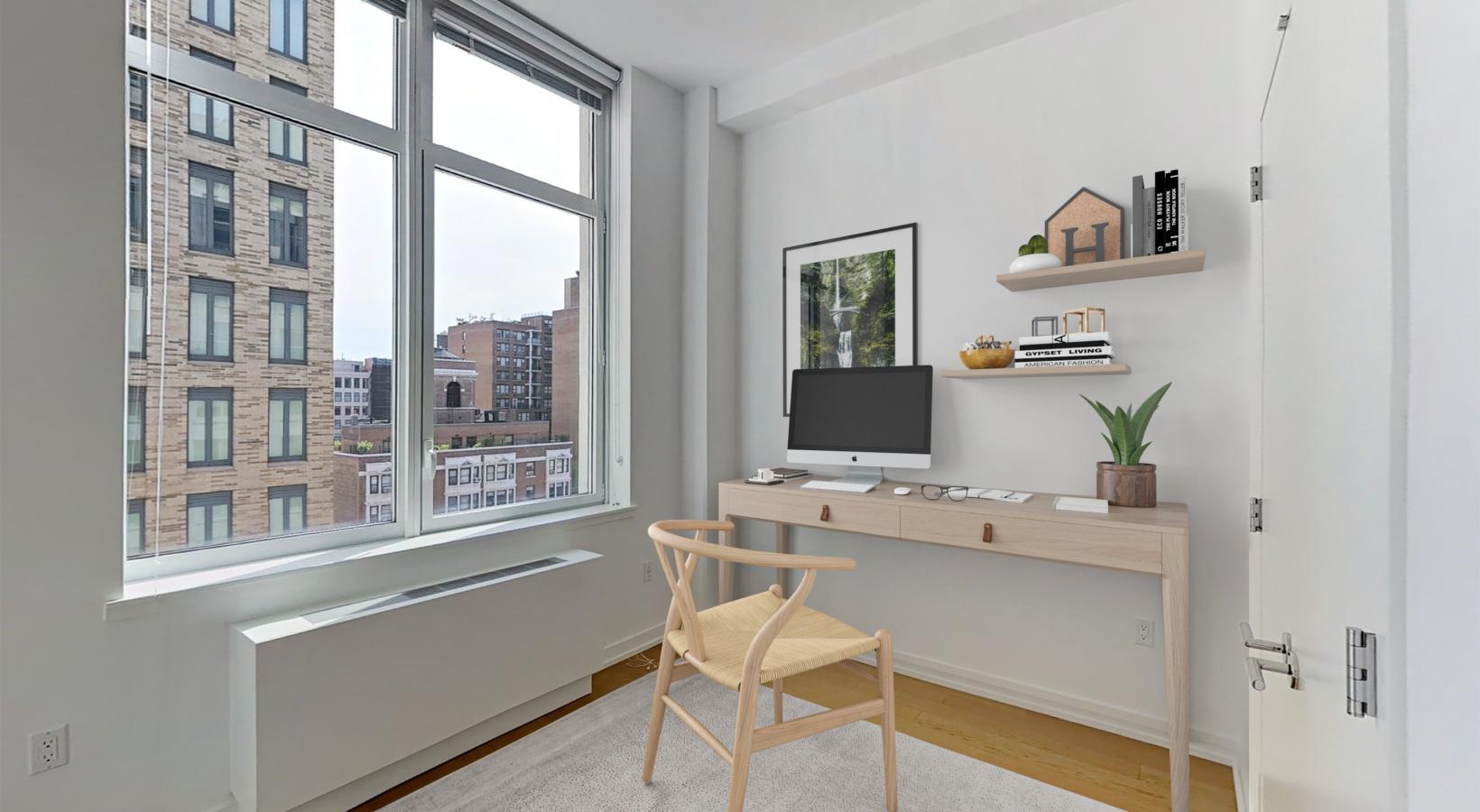 Settle into comfort at The Larstrand a room with a desk and a chair