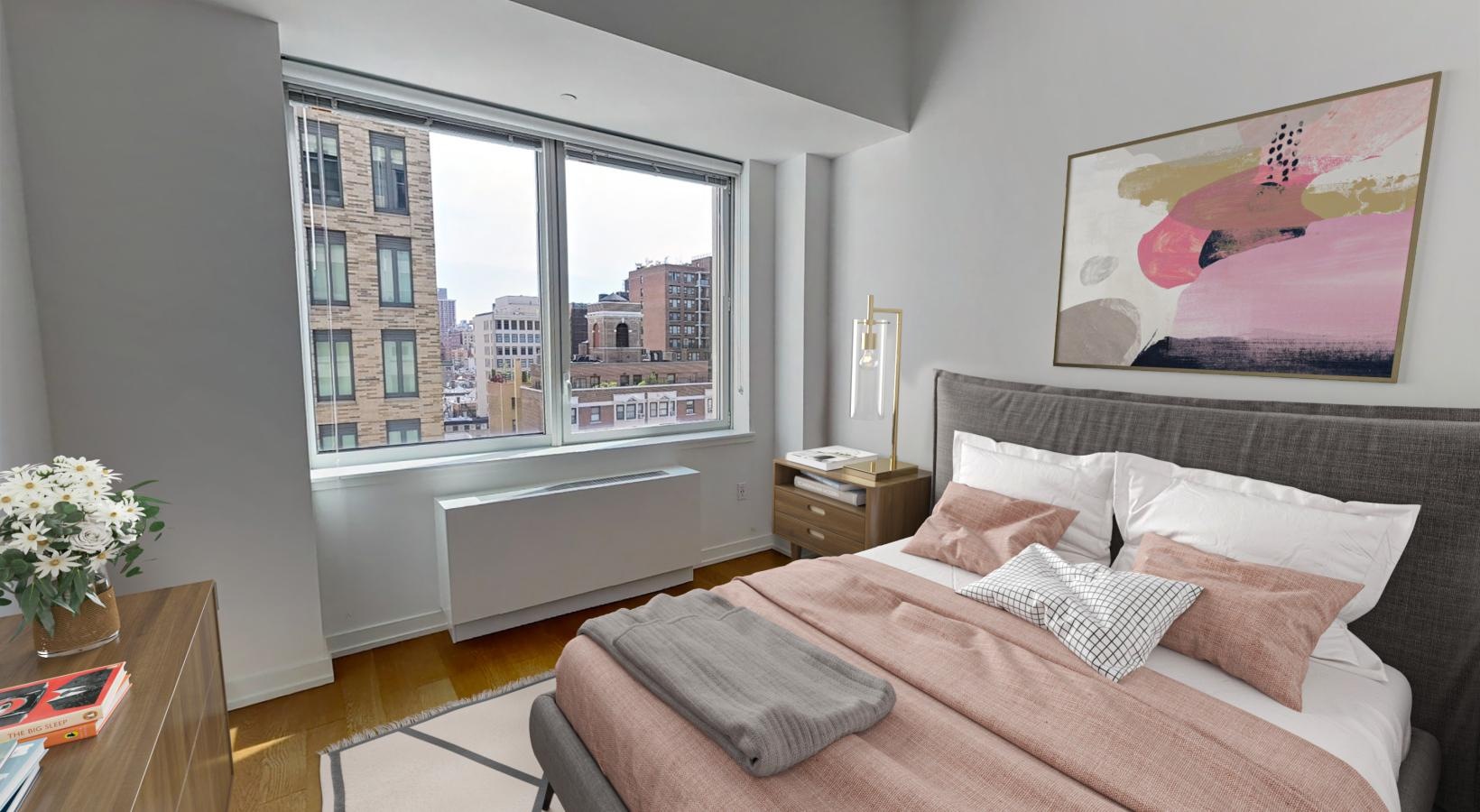 Relax and recharge in beautiful and spacious bedrooms a bedroom with a large window