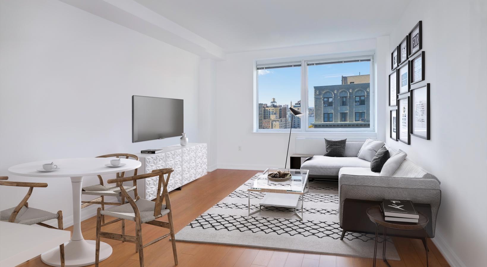 Find your perfect fit at The Larstrand a living room with a tv and couches