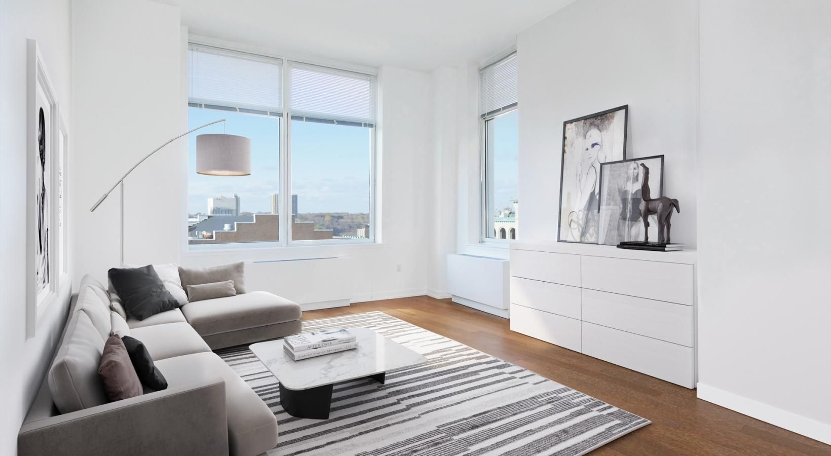 Settle into comfort at The Larstrand a living room with a couch and a coffee table