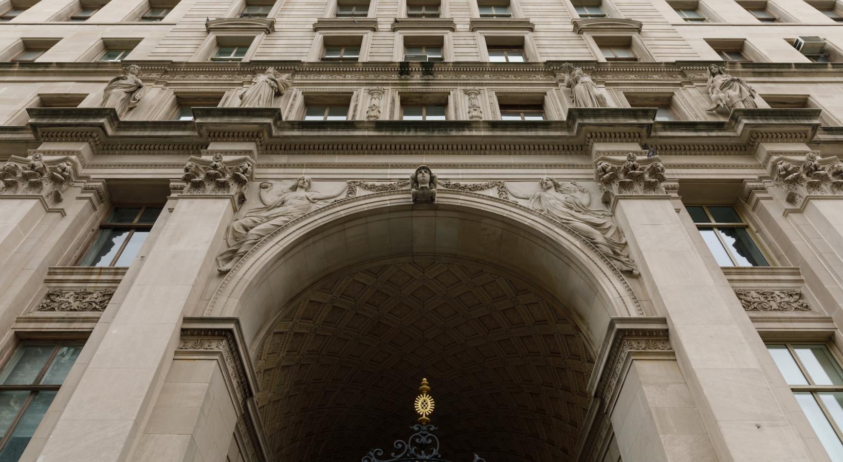 Find your perfect fit at The Larstrand a building with a large arched doorway