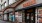 a store front with signs
