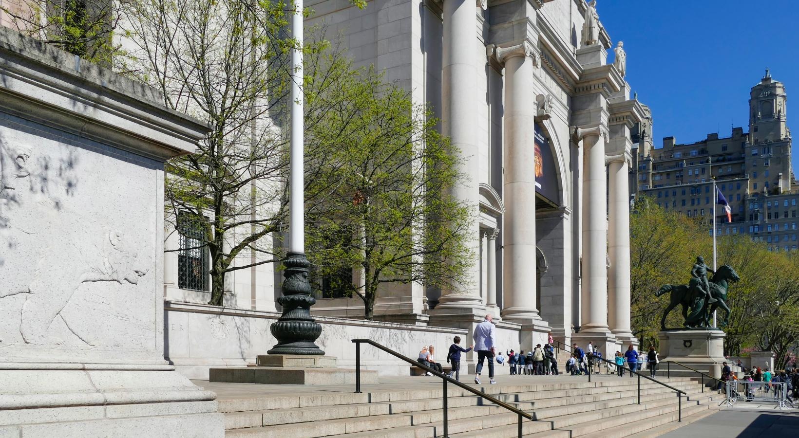 Close to the center of everything a building with columns and a statue