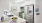 a kitchen with white cabinets