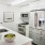 a kitchen with white cabinets