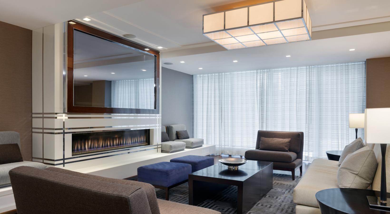 Access to resident-only features a living room with a large mirror