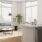 a kitchen with a couch and a table