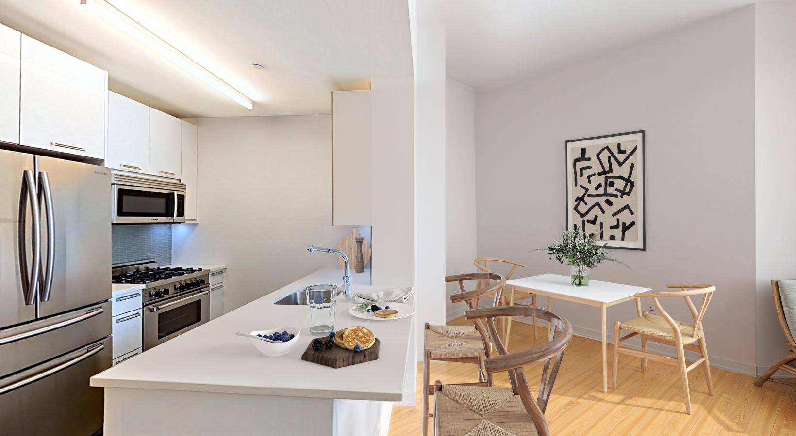 Wide open living areas perfect for entertaining a kitchen with a table and chairs