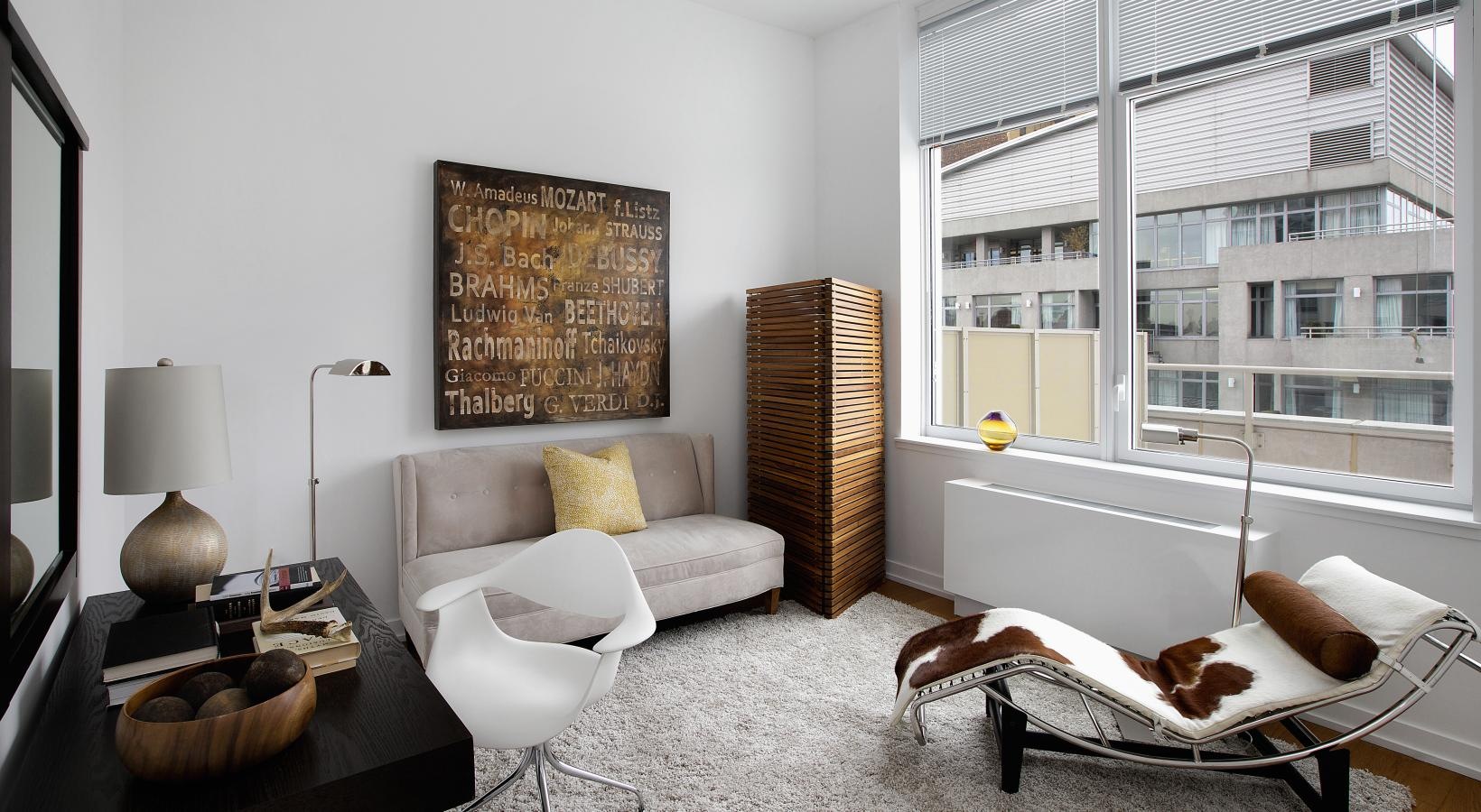 Beautiful living spaces with natural lighting a living room with a couch and a coffee table